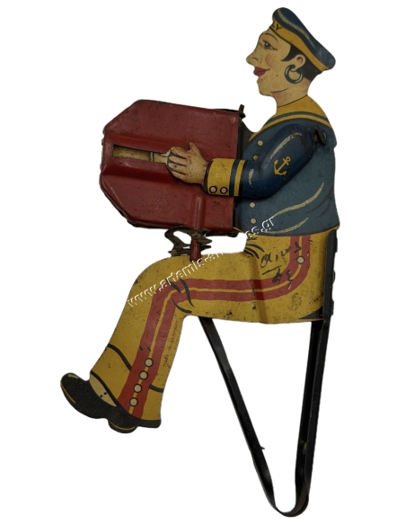 Ναύτης που παίζει ακορντεόν, Τσίγκινο Παιχνίδι Σφυρίχτρα από τον George Levy